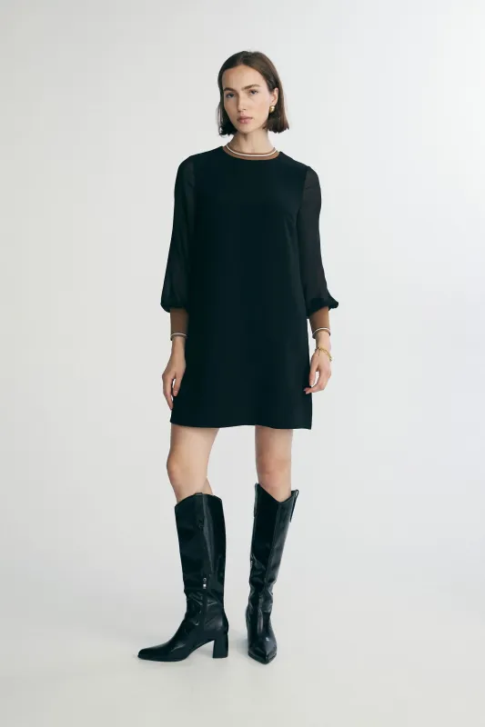 Straight dress with sheer sleeves sold by Tristan Style