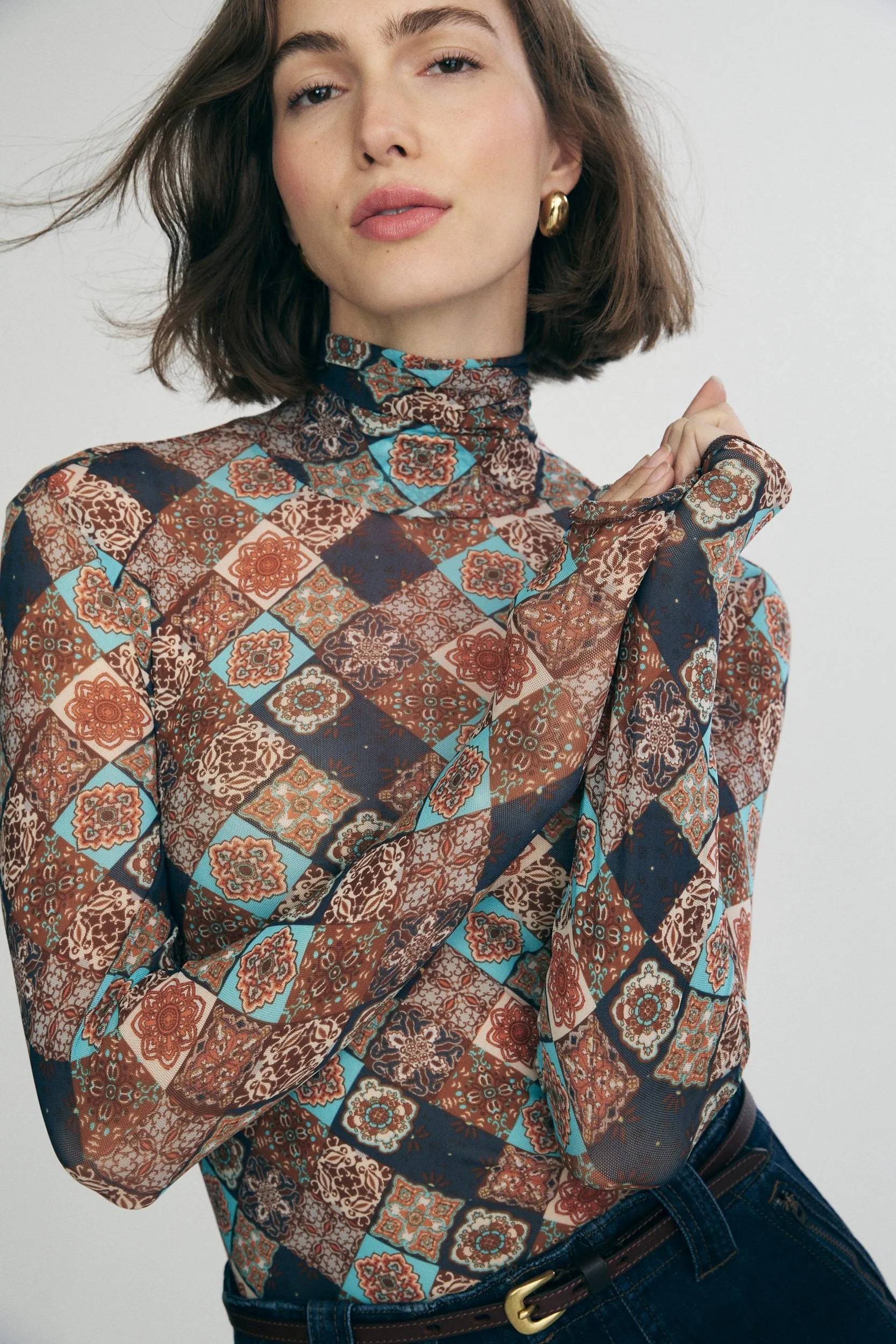 Print micro mesh turtleneck sold by Tristan Style