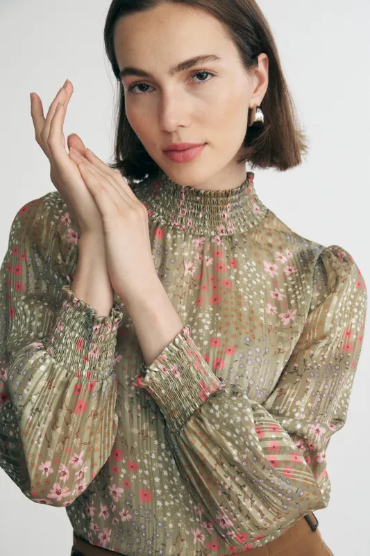 Fluid printed blouse with ruching sold by Tristan Style