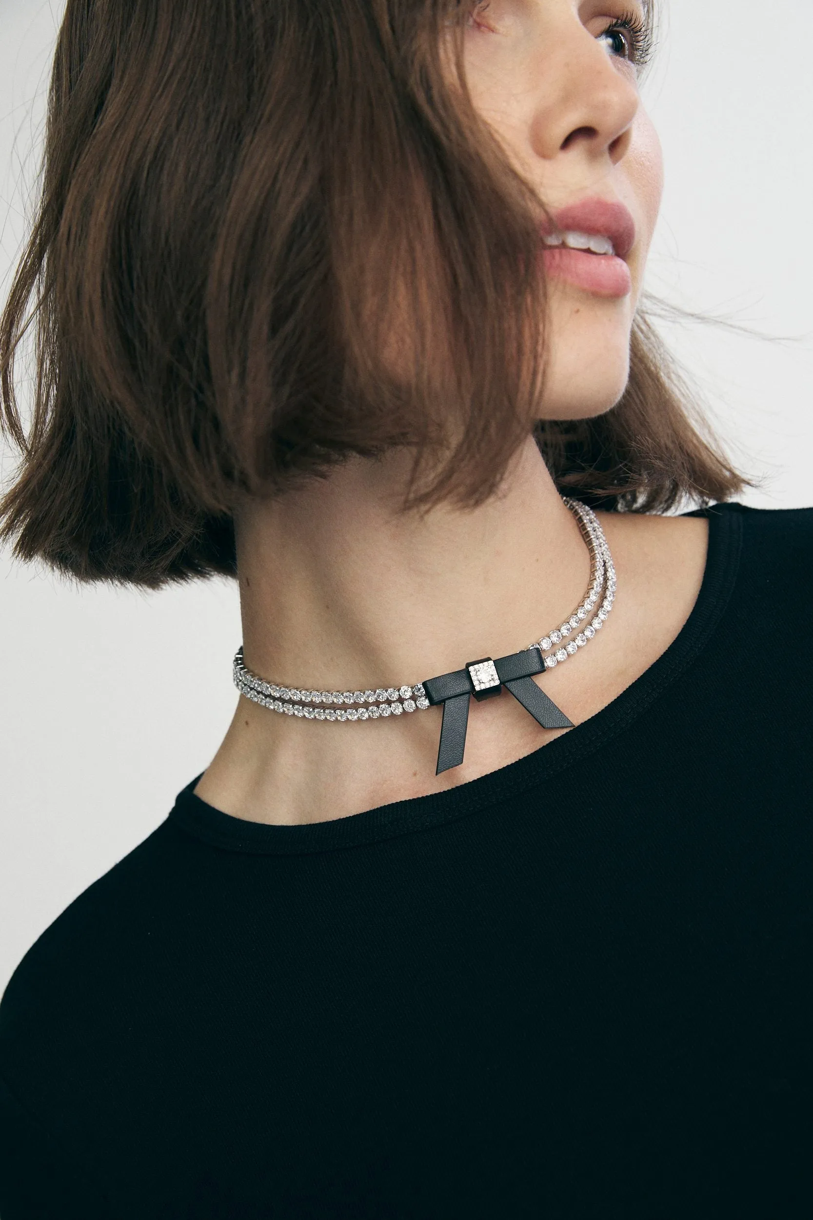 Necklace with bow sold by Tristan Style