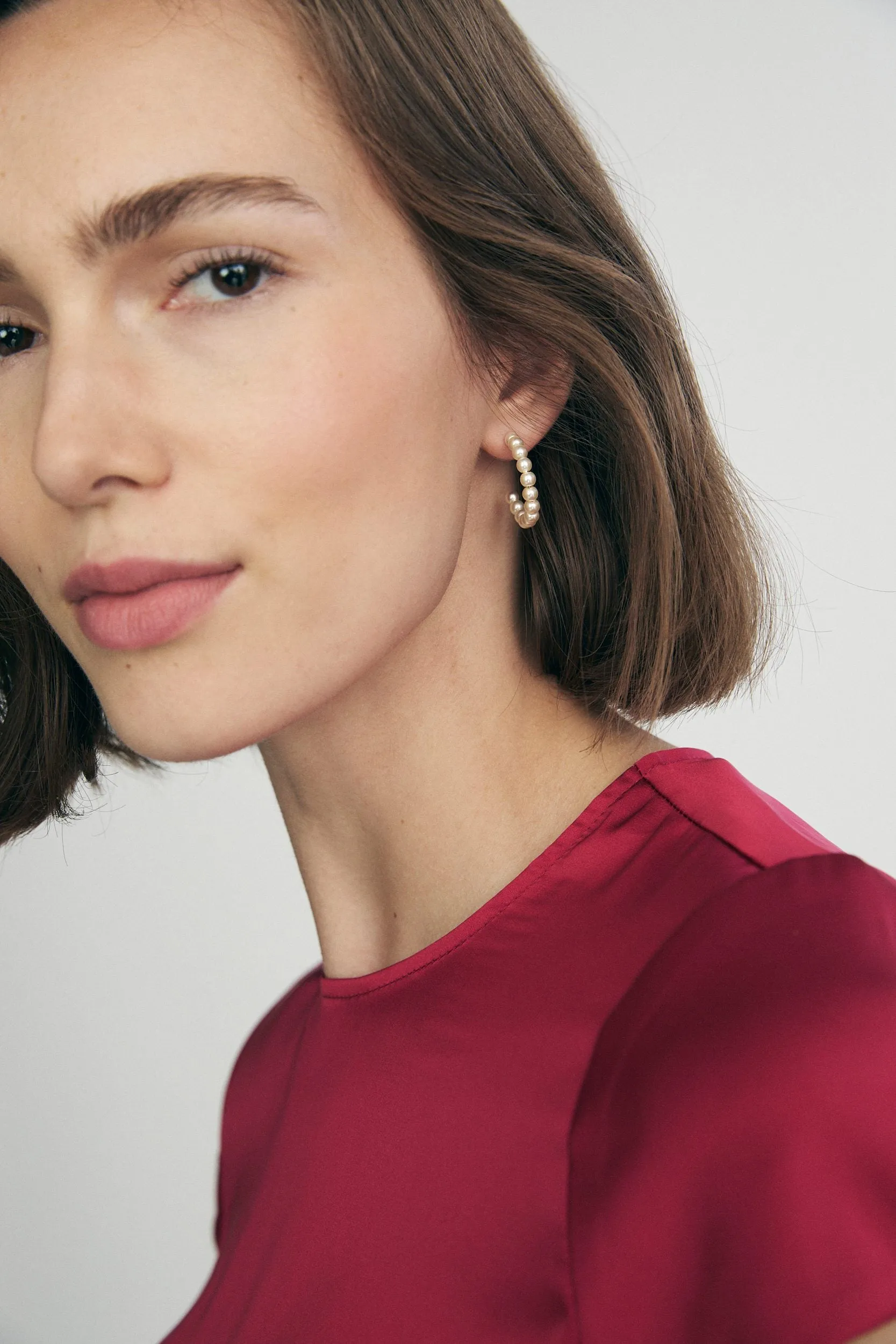 Pearl hoop earring sold by Tristan Style