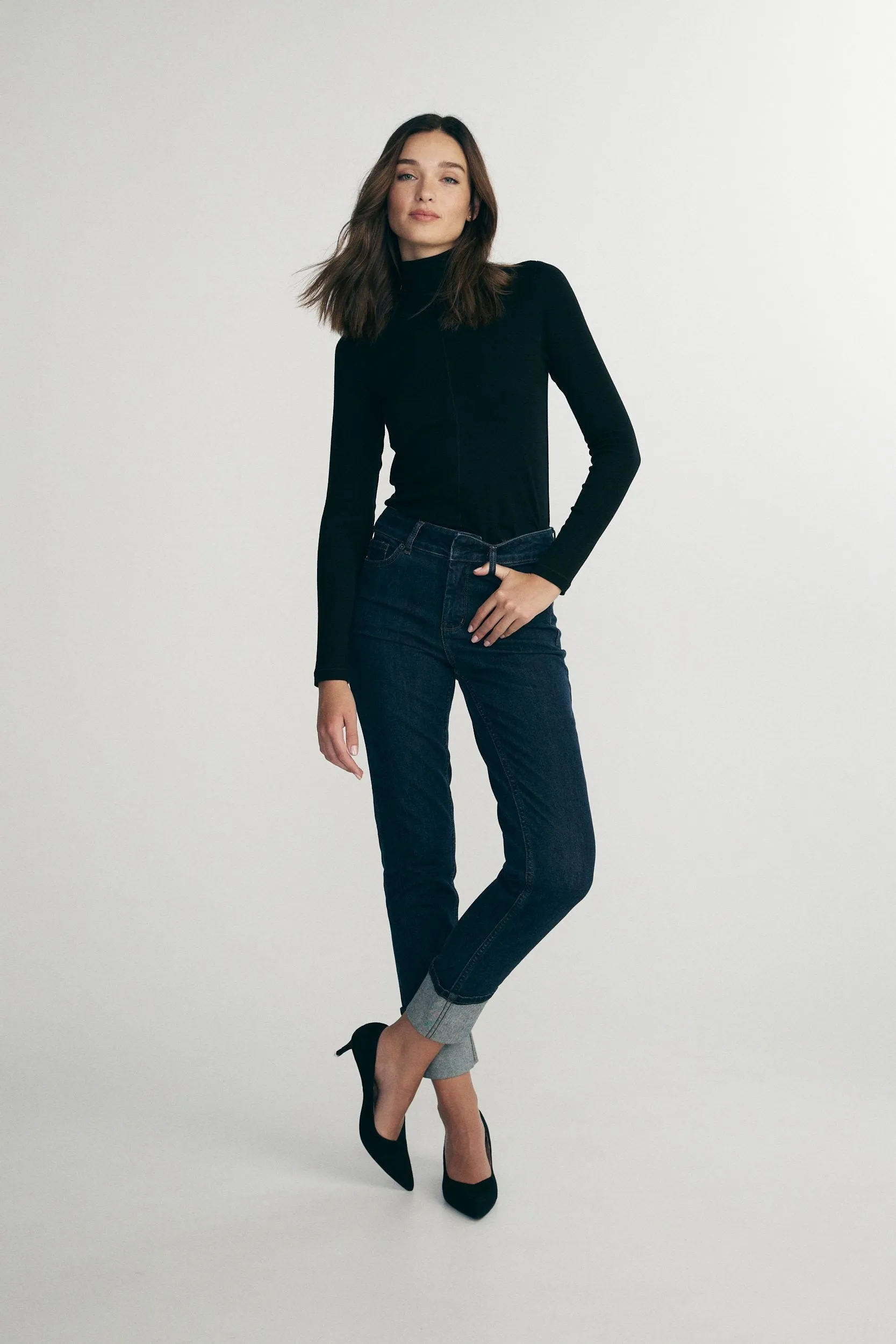 Stretch turtleneck sold by Tristan Style