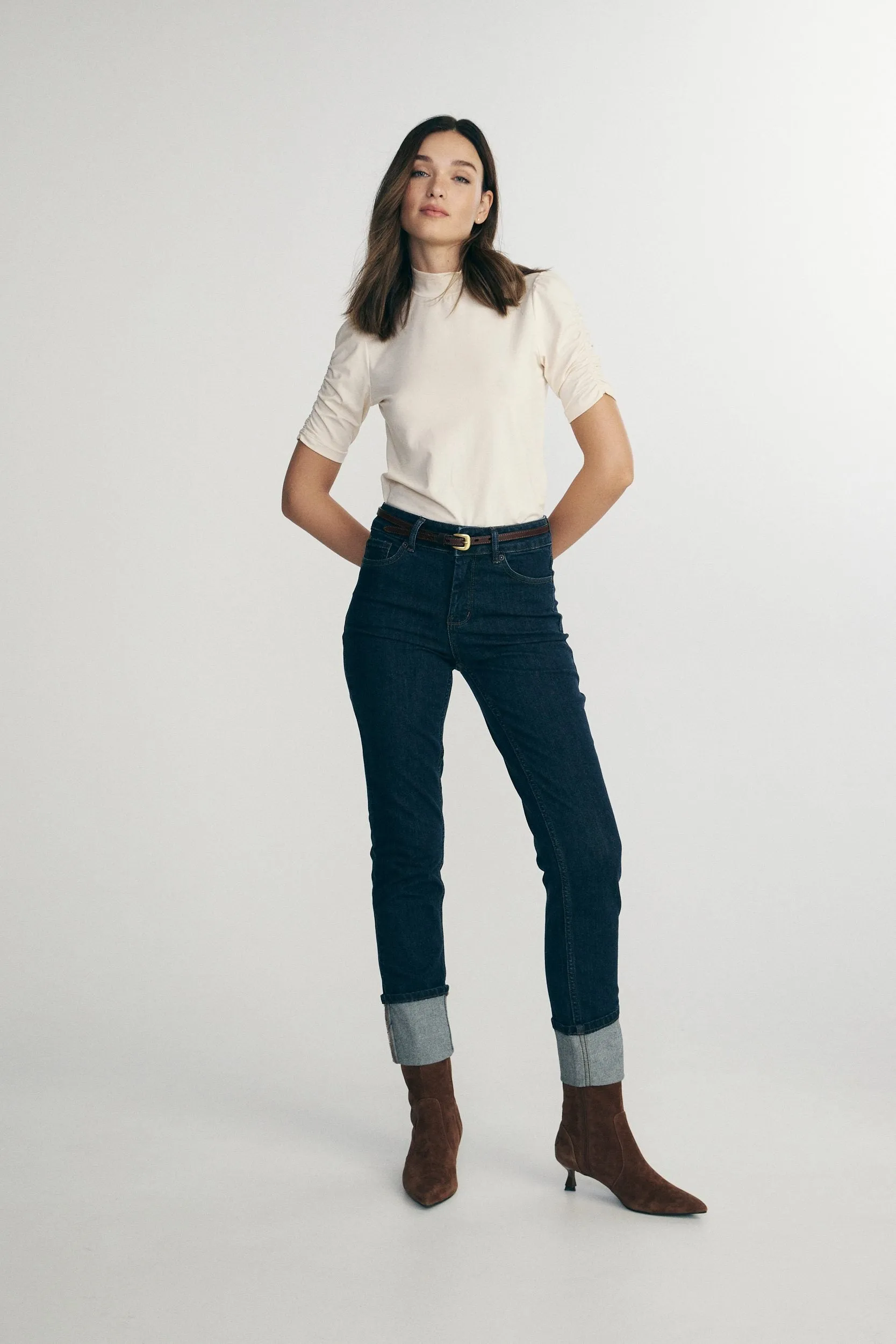 Mock neck jersey top sold by Tristan Style