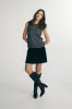 Mock neck sleeveless top sold by Tristan Style