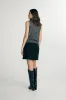 Mock neck sleeveless top sold by Tristan Style