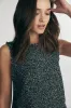 Mock neck sleeveless top sold by Tristan Style