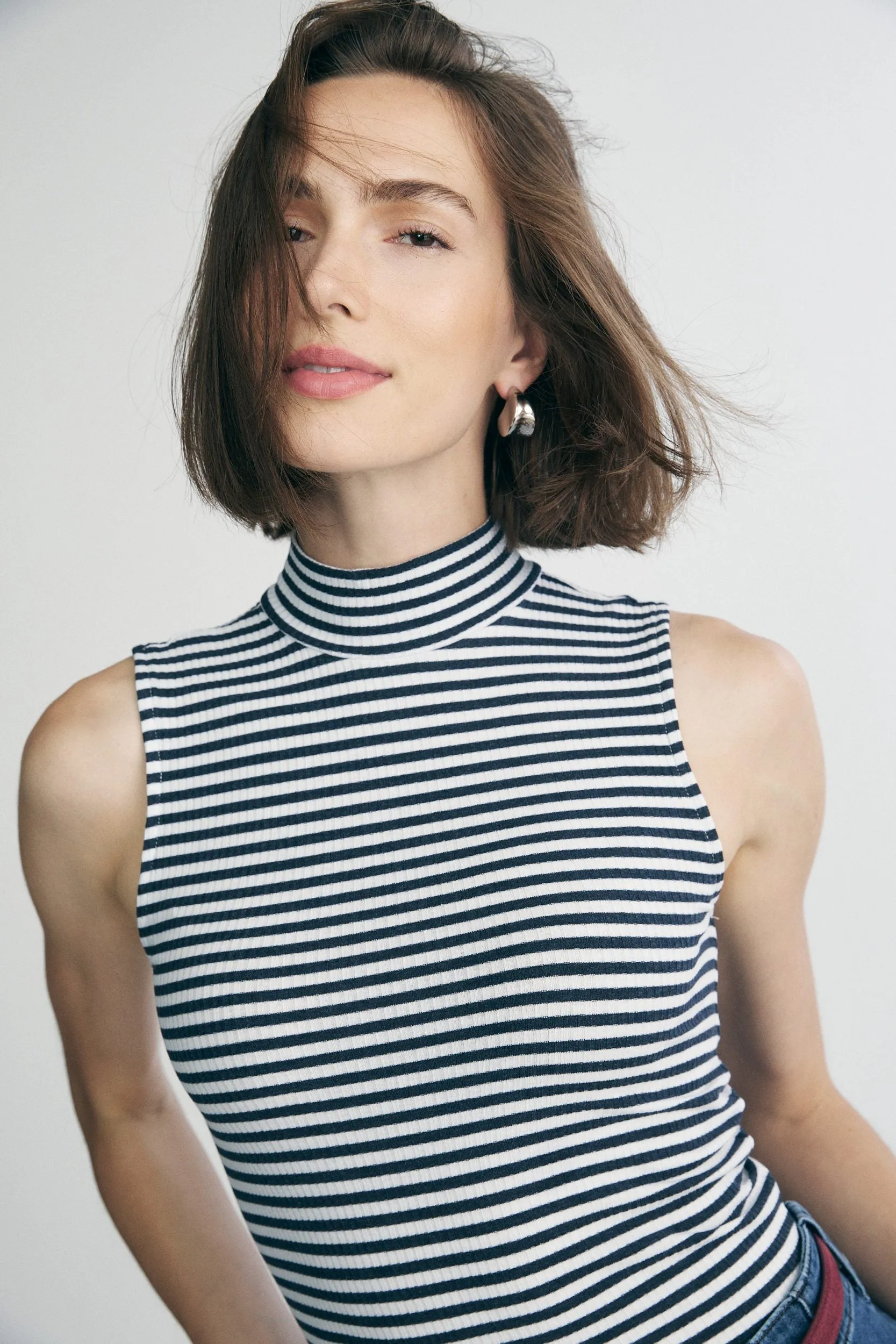 Mock neck top sold by Tristan Style