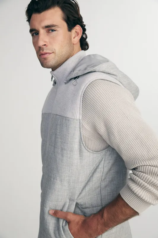 Quilted vest with hood sold by Tristan Style