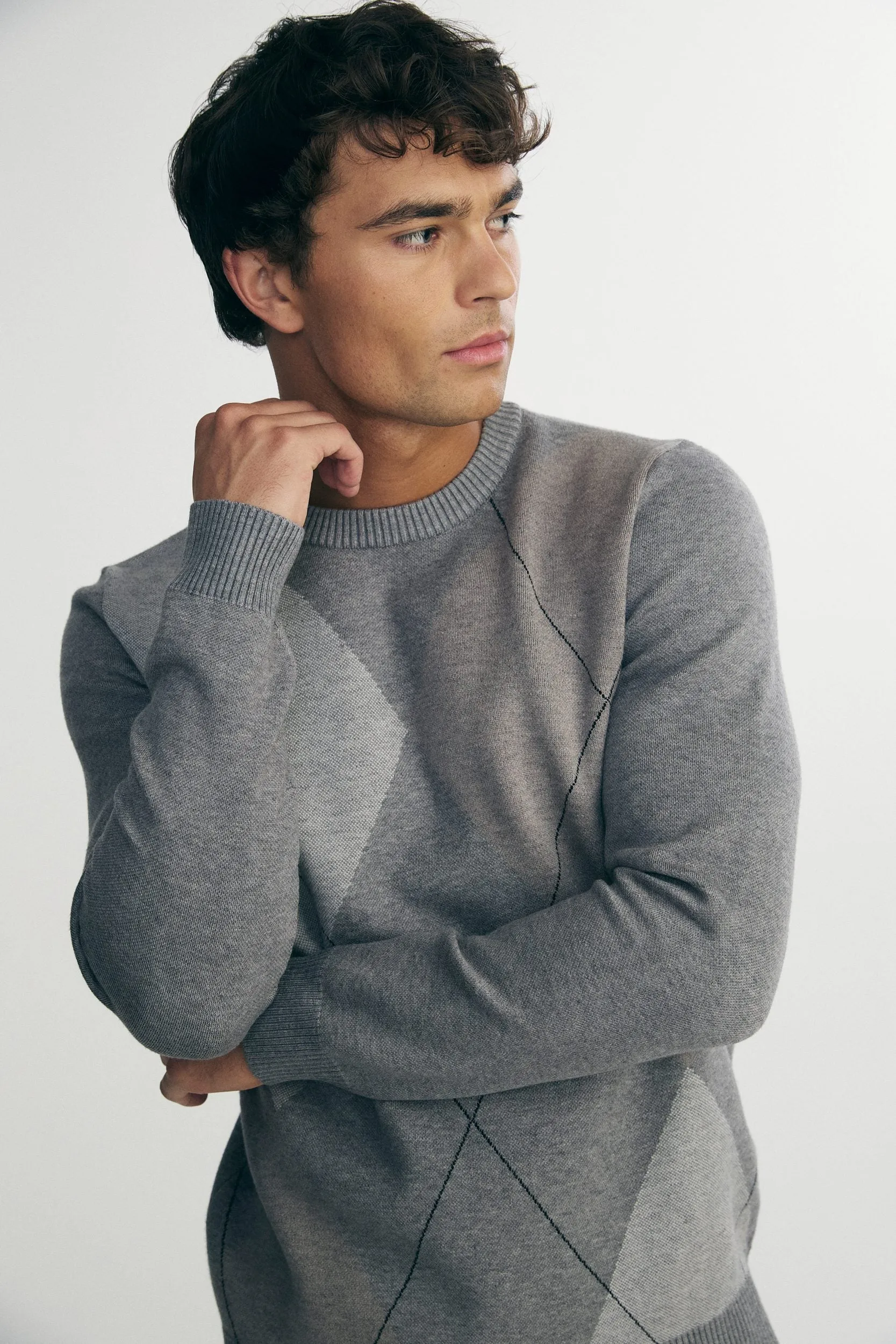 Argyle jacquard sweater sold by Tristan Style