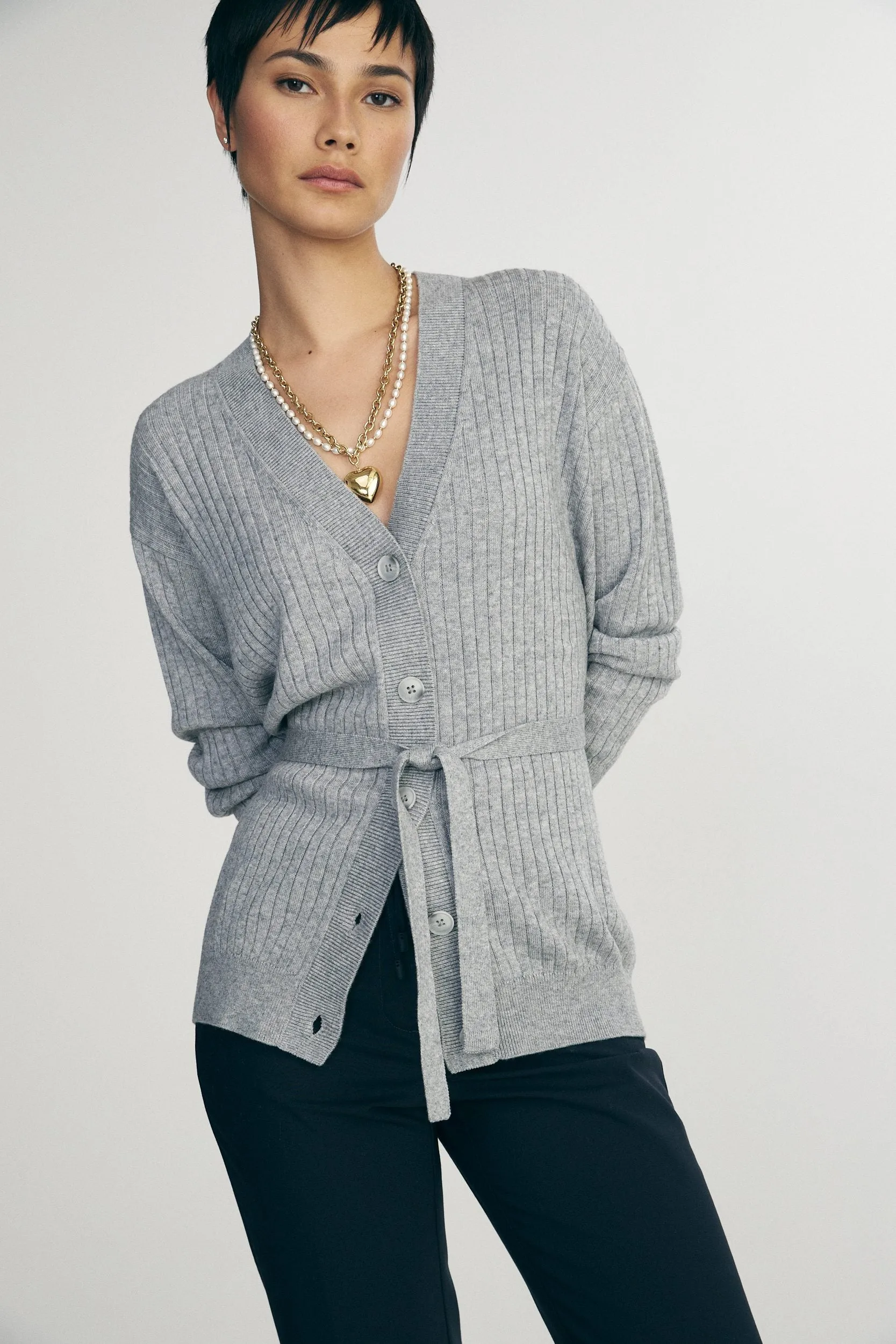 Relaxed cardigan with belt sold by Tristan Style