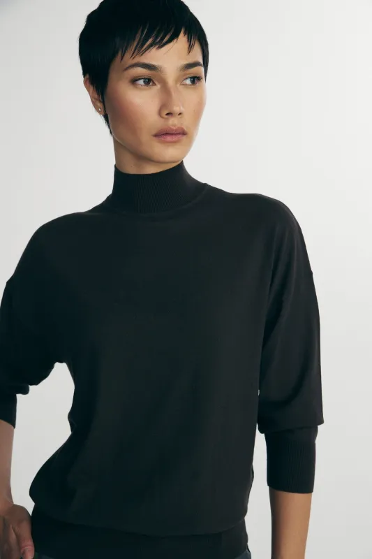 Loose mock neck sweater made by Tristan Style