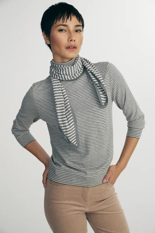 Striped turtle neck sweater sold by Tristan Style