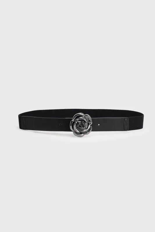 Stretch belt with flower-shaped buckle sold by Tristan Style