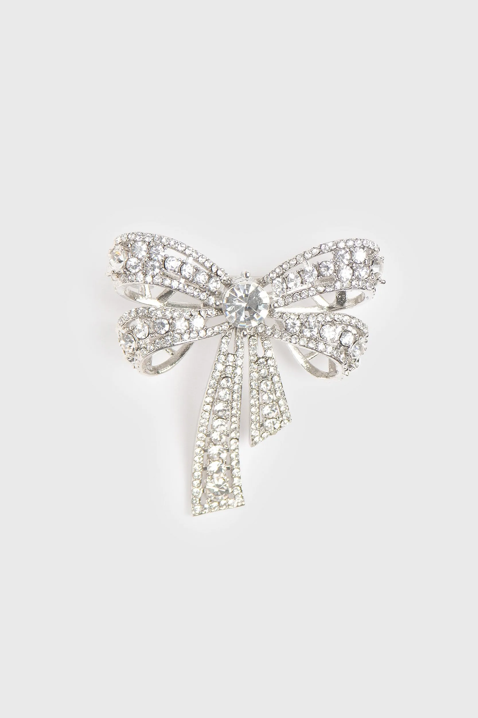 Crystal bow brooch sold by Tristan Style