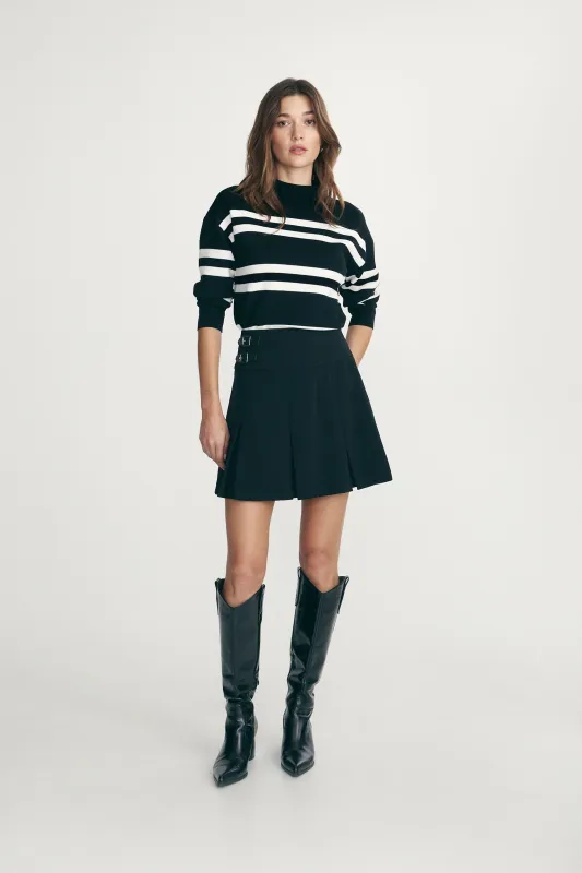 Pleated skirt sold by Tristan Style