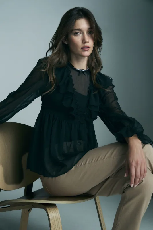 Gathered fluid blouse sold by Tristan Style