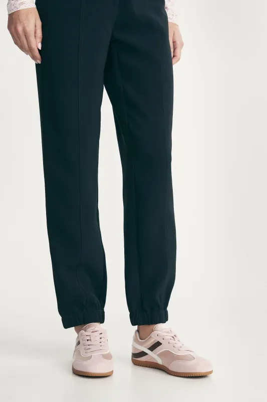 Satin sneakers sold by Tristan Style