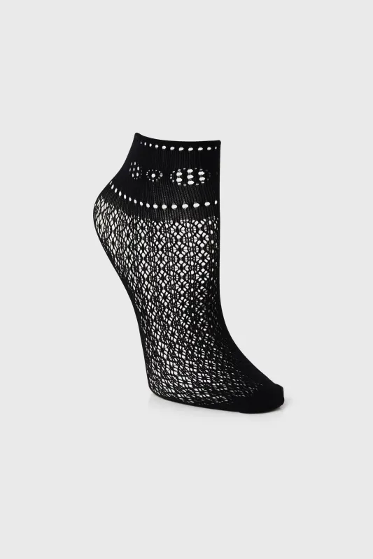 Fishnet socks with geometric pattern sold by Tristan Style