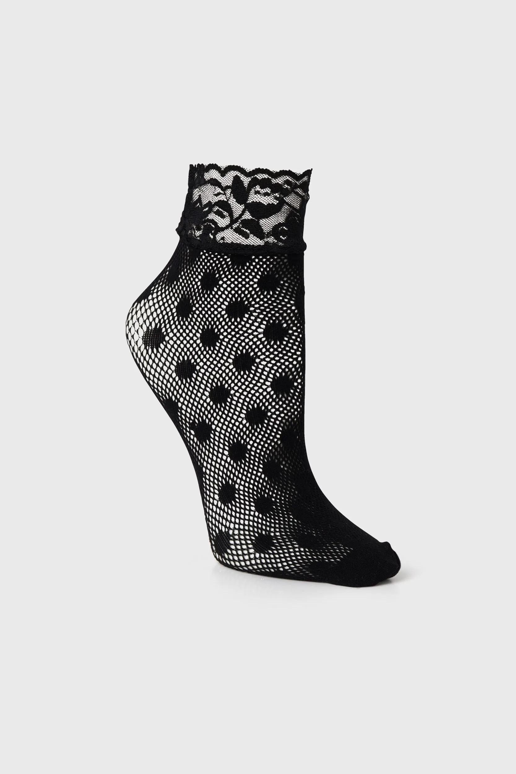 Polka dot fishnet socks with lace sold by Tristan Style