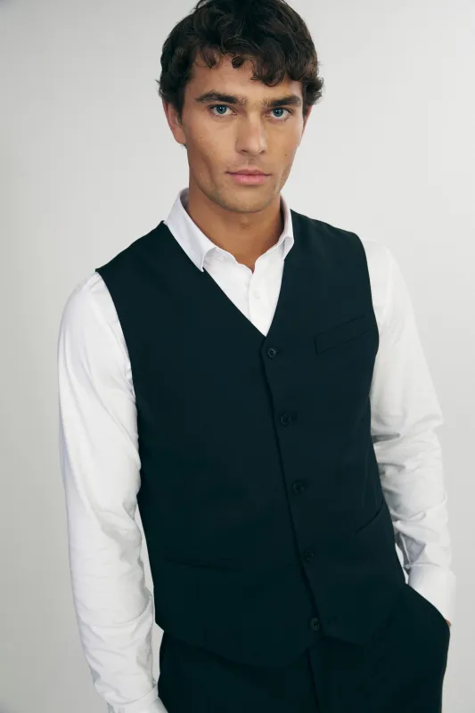 Fitted vest sold by Tristan Style