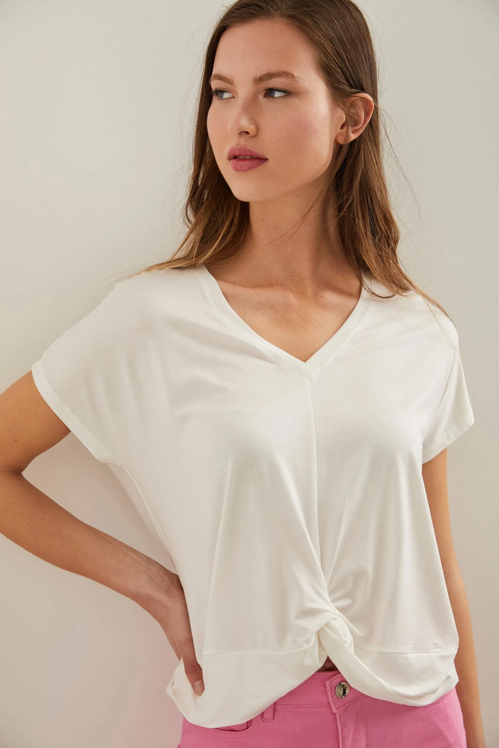 V neck top with twist sold by Tristan Style