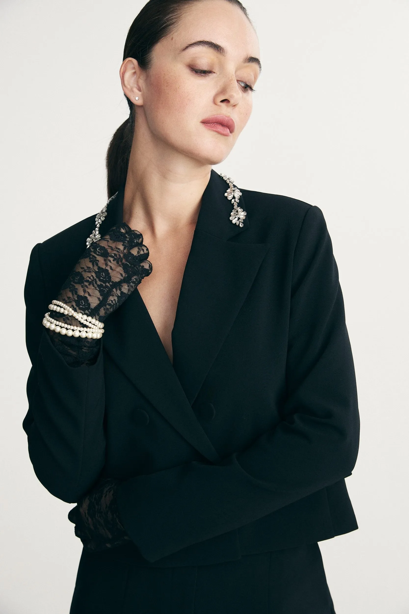 Blazer with crystal-embellished collar sold by Tristan Style