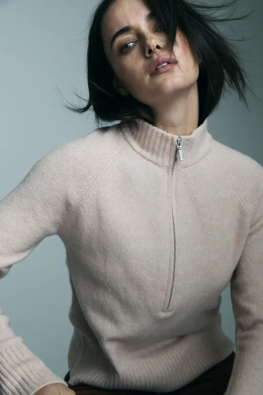 Half-zipped mock neck sweater sold by Tristan Style