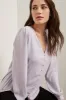 Front & back blouse with puffy sleeves sold by Tristan Style