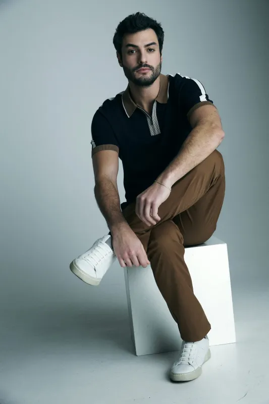 Color blocking knitted polo sold by Tristan Style