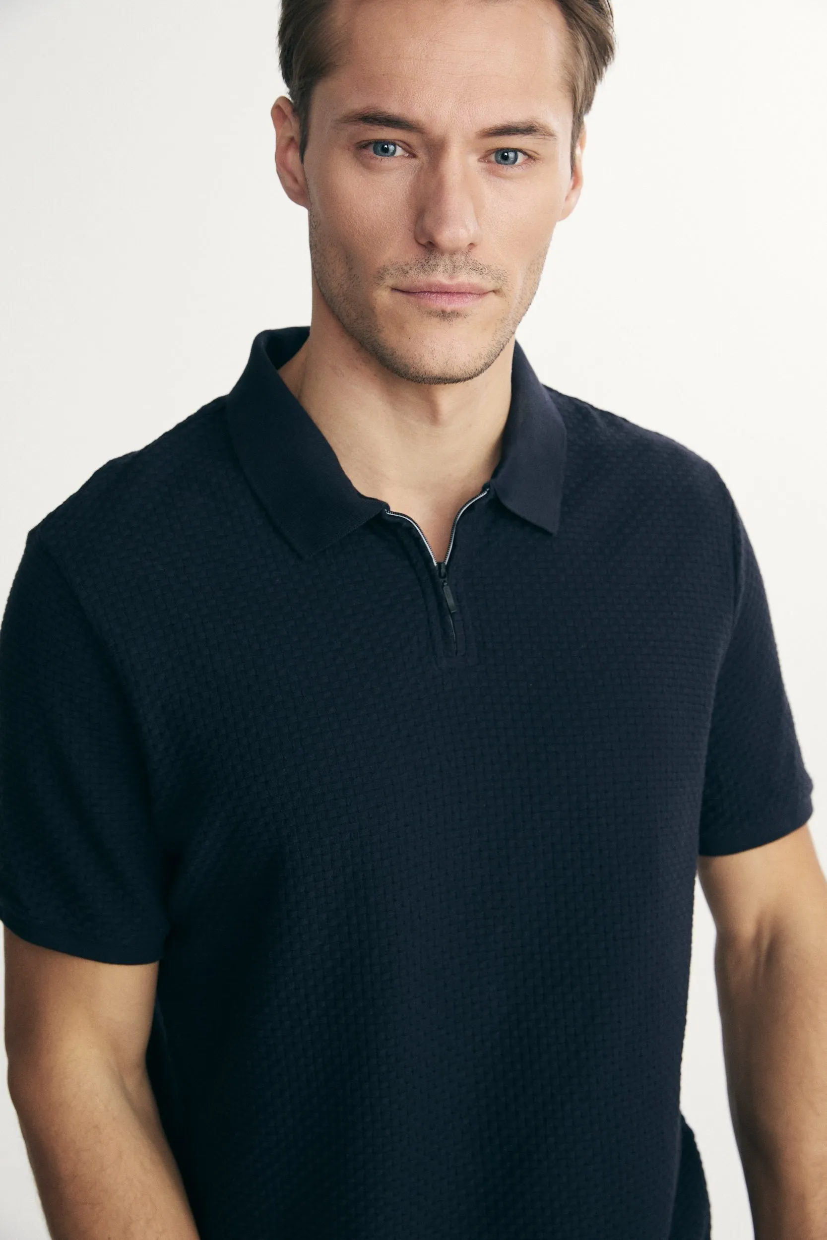 Contrasting detail polo sold by Tristan Style