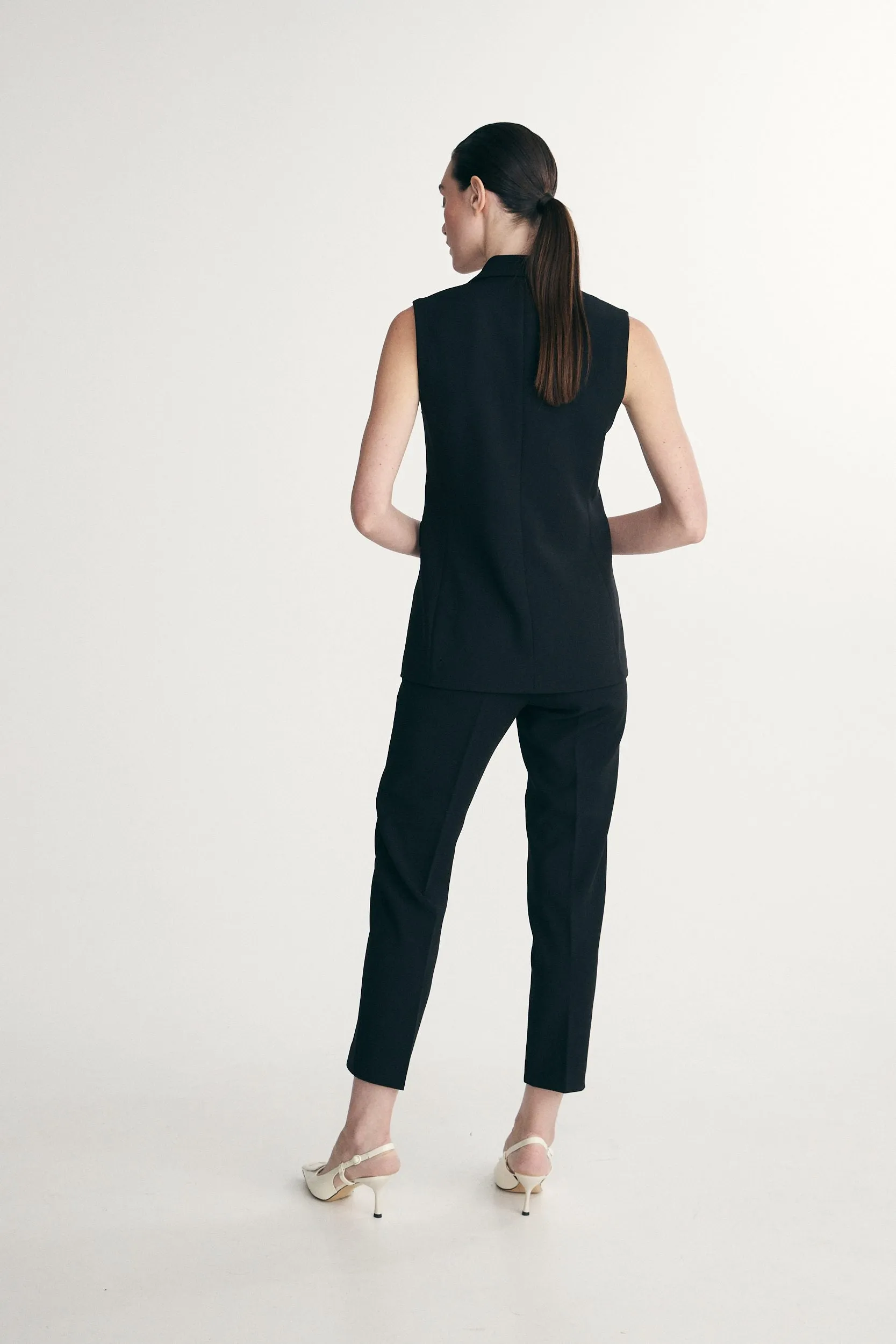 Sleeveless vest sold by Tristan Style product image thumbnail 2
