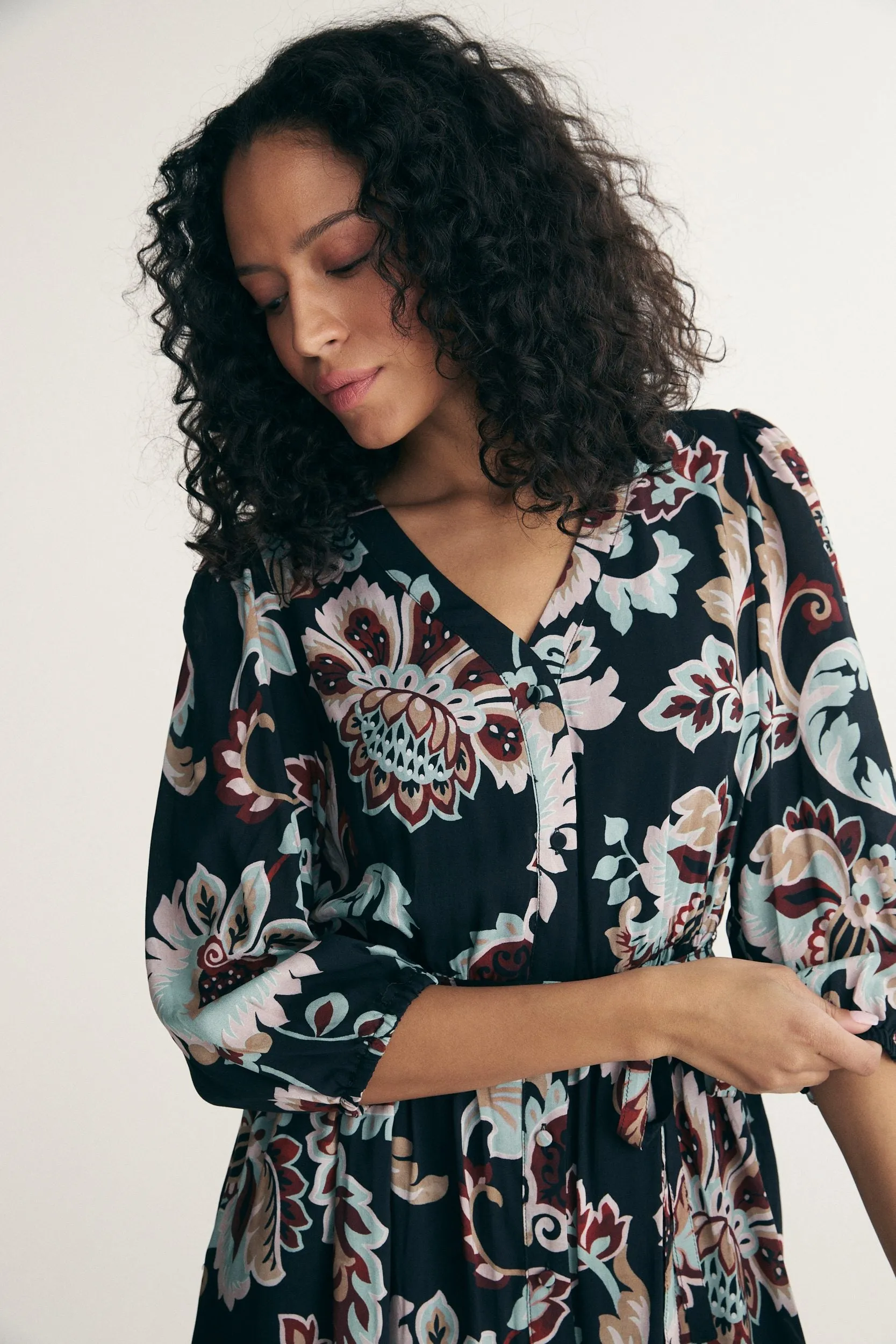 Printed fluid dress sold by Tristan Style