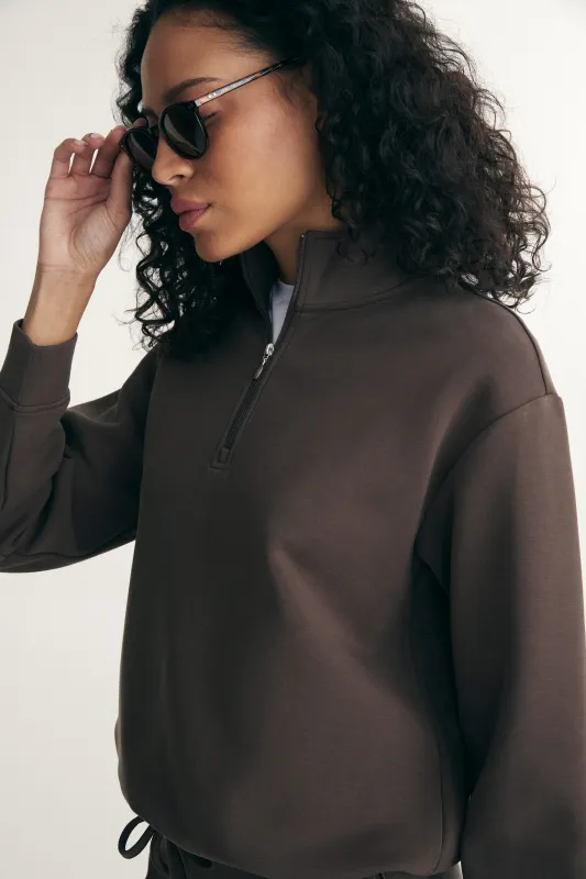 Half zip ponte top sold by Tristan Style