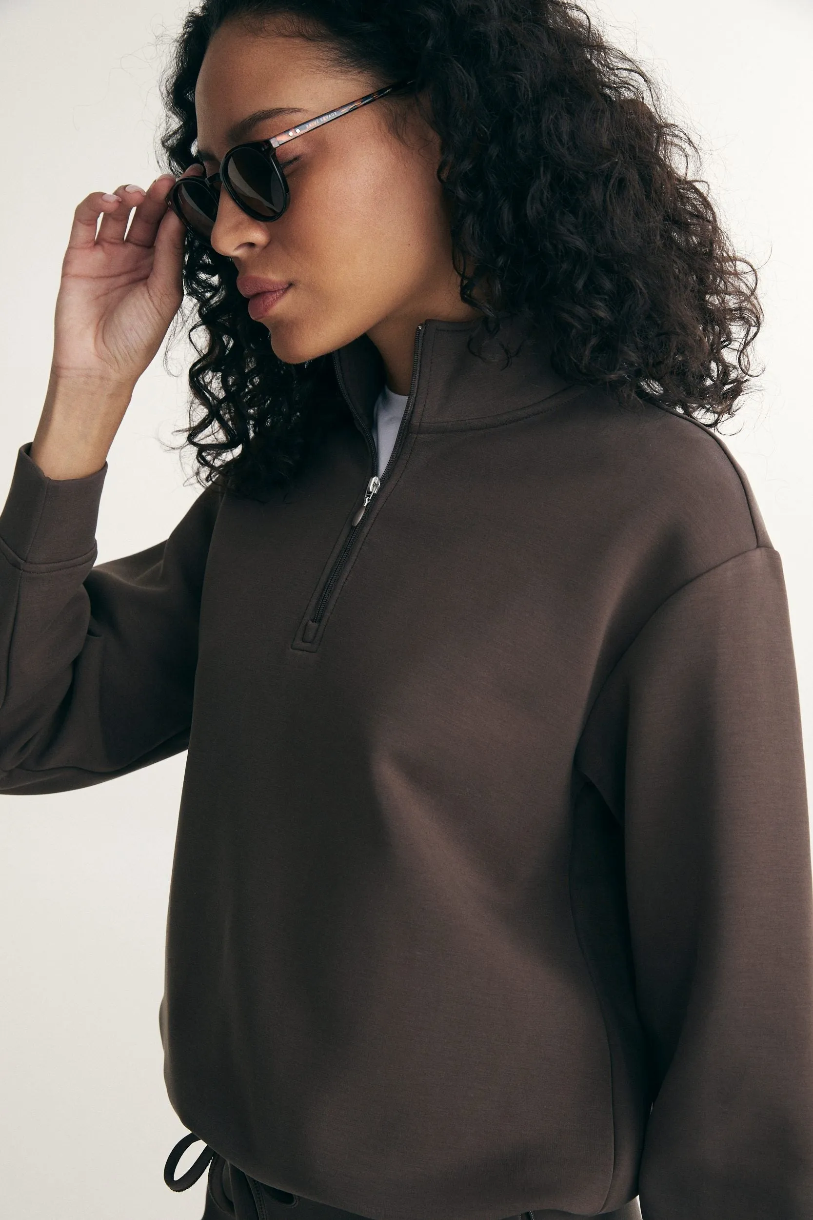 Half zip ponte top sold by Tristan Style