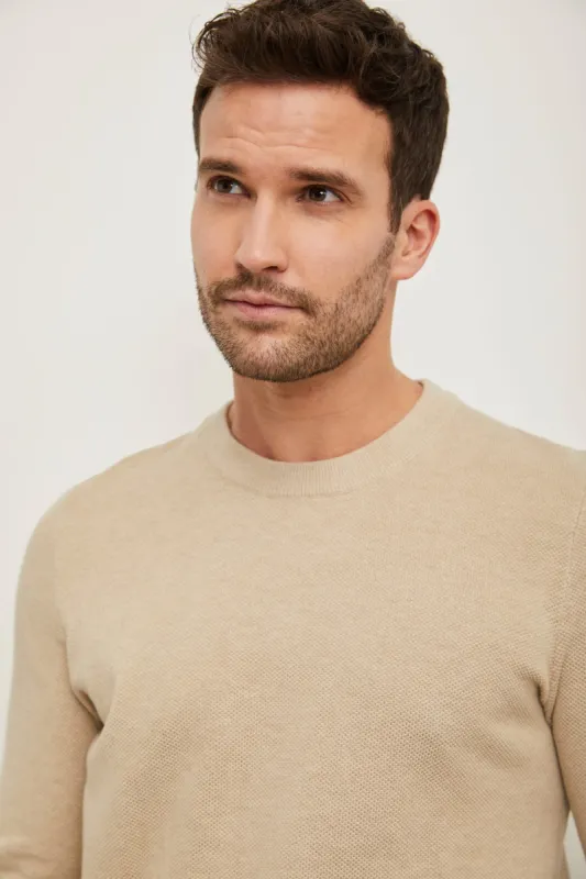 Textured crew neck sweater sold by Tristan Style