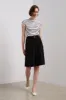 Pleated bermuda shorts with double belts sold by Tristan Style