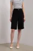 Pleated bermuda shorts with double belts sold by Tristan Style