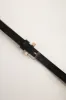 Belt with clear buckle sold by Tristan Style