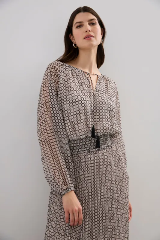 Blouse with fitted waistband sold by Tristan Style