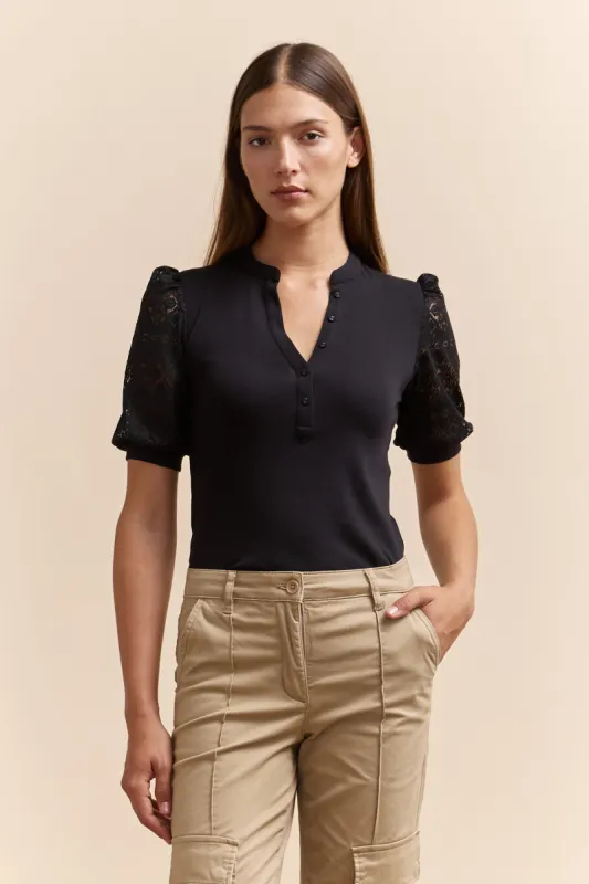 Multi fabrics top with puffy sleeve sold by Tristan Style
