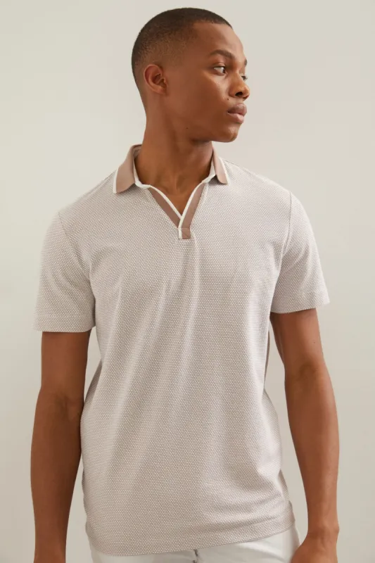 Jacquard johnny collar polo sold by Tristan Style