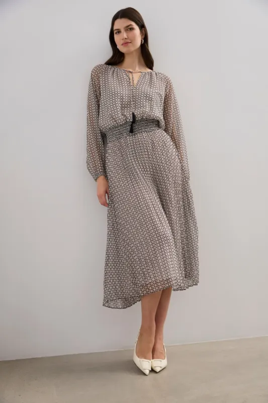 Print pleated skirt sold by Tristan Style