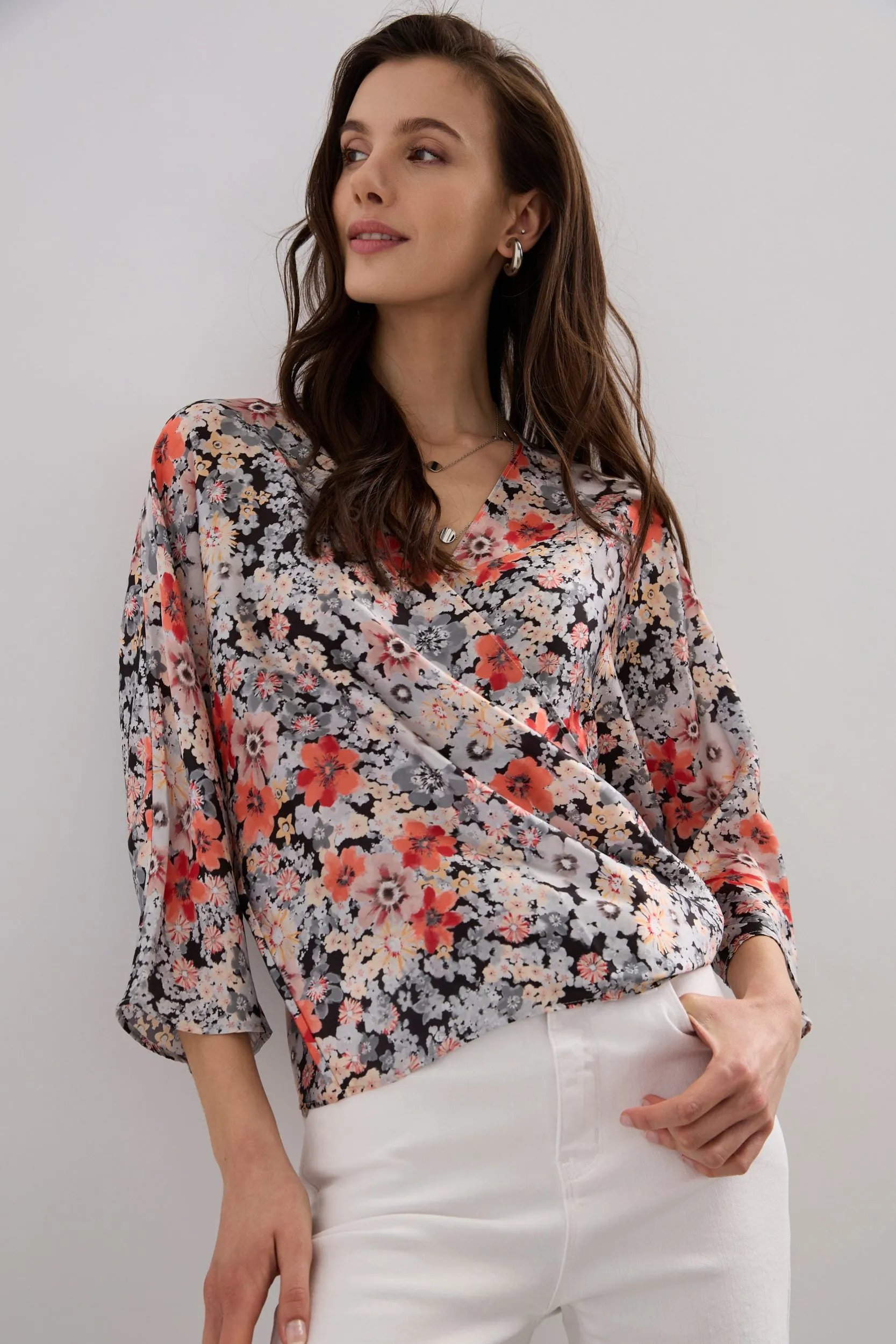 Floral print wrap blouse sold by Tristan Style
