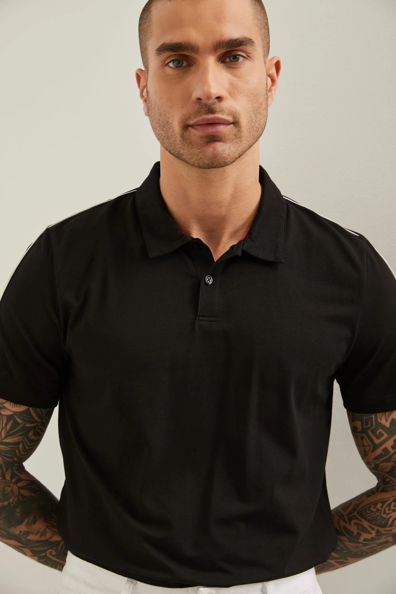 Contrasting detail polo sold by Tristan Style