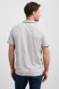 Textured jersey polo sold by Tristan Style