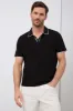 Textured jersey polo sold by Tristan Style