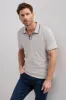 Textured jersey polo sold by Tristan Style