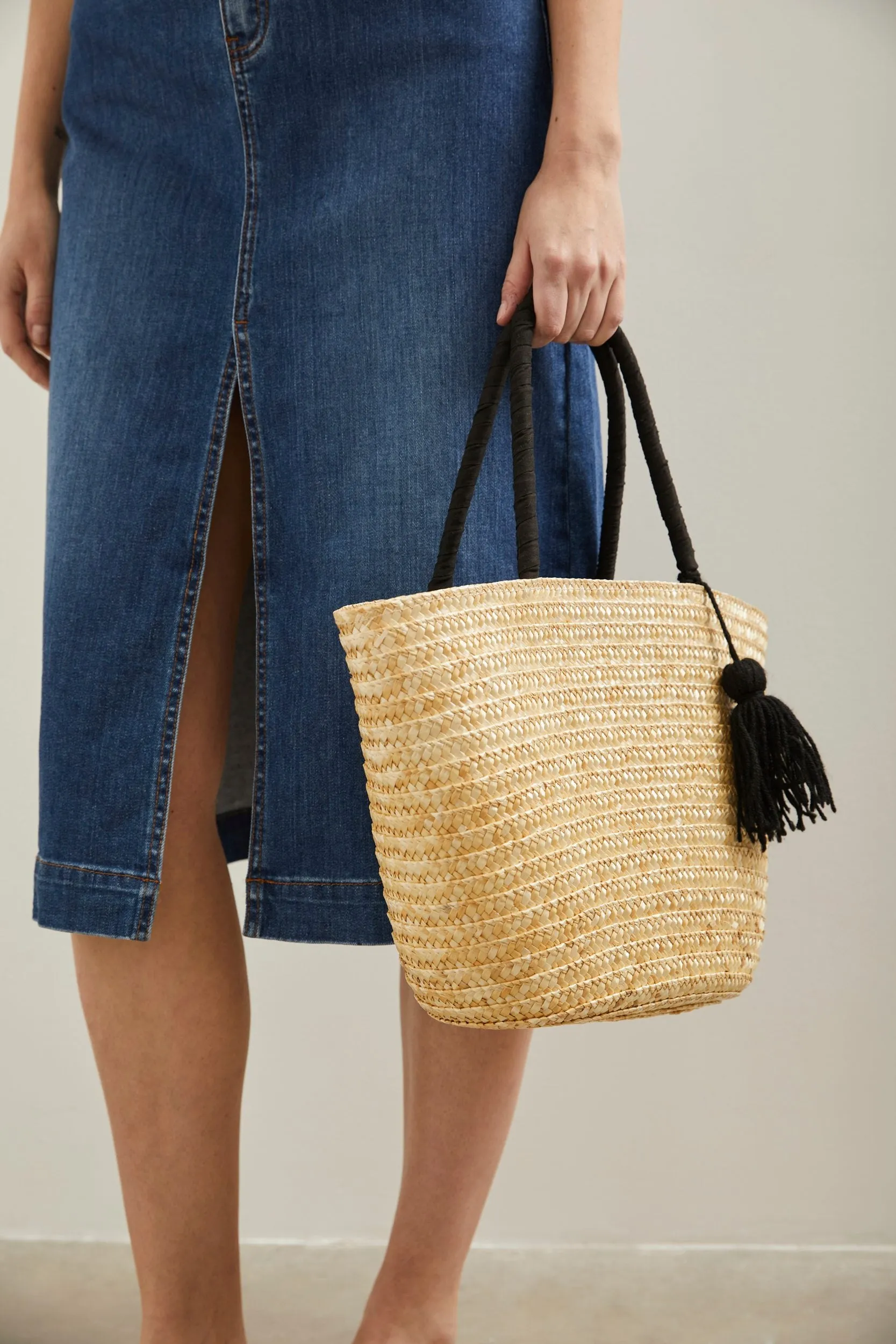 Straw bag sold by Tristan Style