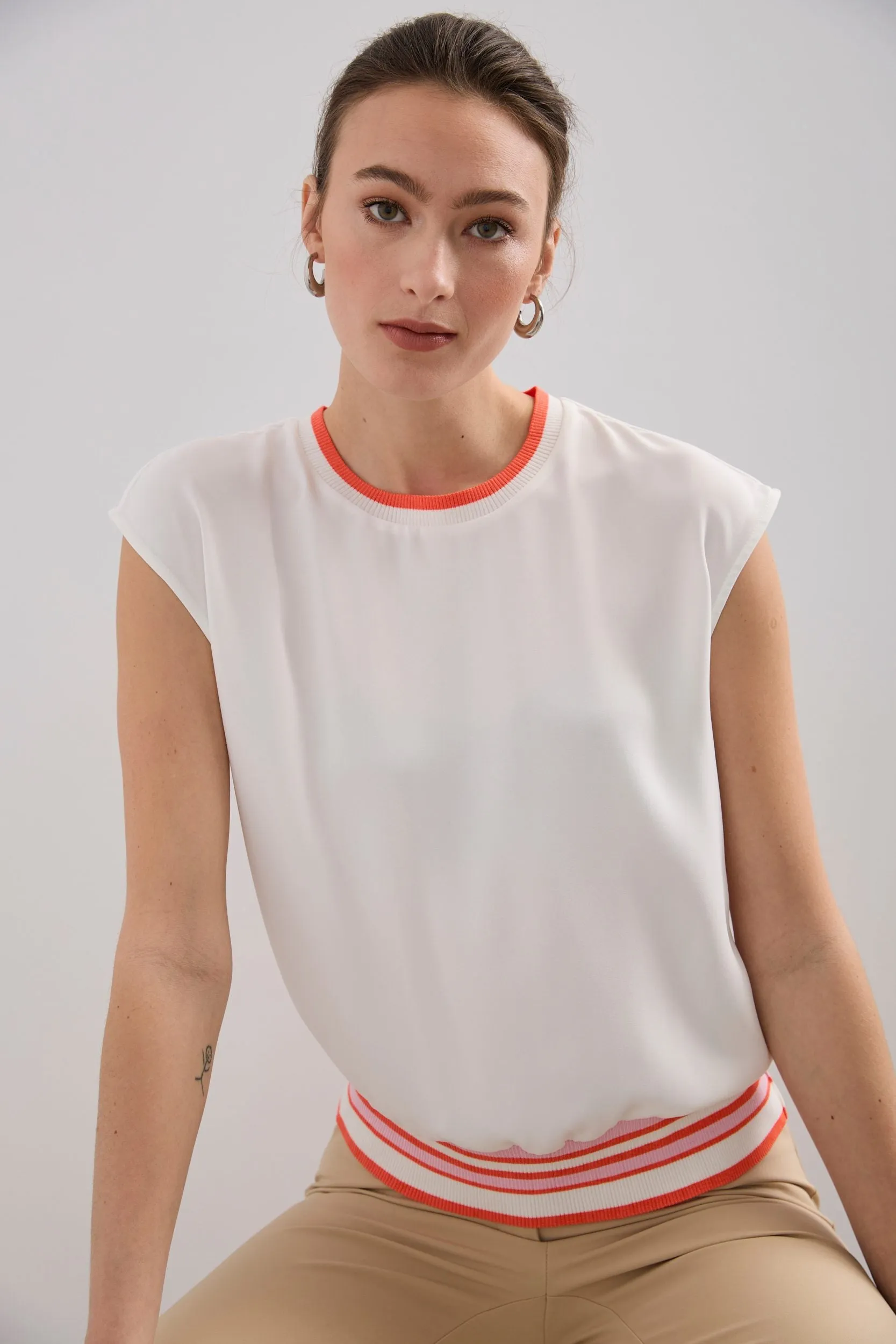 Sleeveless top with striped rib knit detail sold by Tristan Style