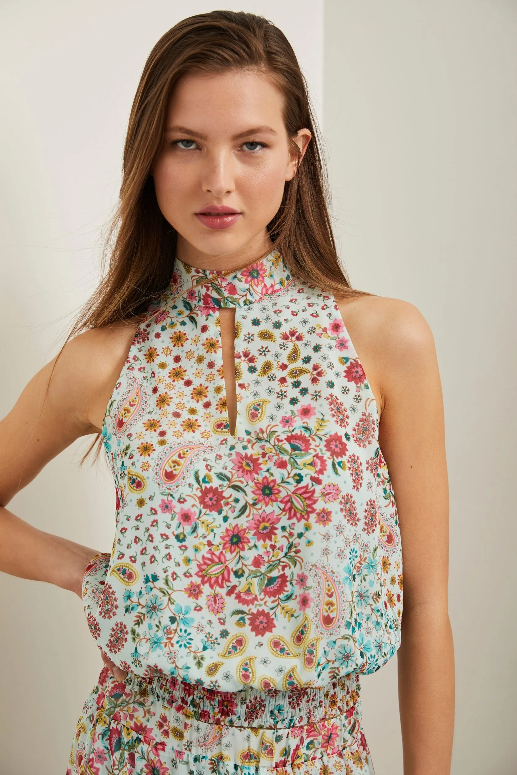 Floral printed blouse with ruched waistband sold by Tristan Style